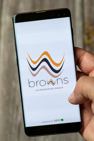 04-13-2021 Portsmouth, Hampshire, UK A Mobile phone or Cell phone being held in a hand showing the...