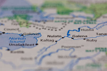 04-28-2021 Portsmouth, Hampshire, UK, Nulato Alaska USA shown on a geography map or road mapのeditorial素材