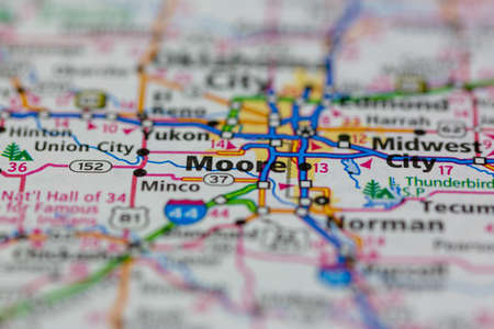 06-15-2021 Portsmouth, Hampshire, UK, Moore Oklahoma USA shown on a Geography map or road mapのeditorial素材