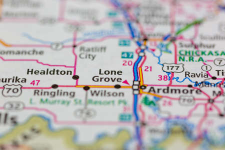 06-15-2021 Portsmouth, Hampshire, UK, Lone Grove Oklahoma USA shown on a Geography map or road mapのeditorial素材