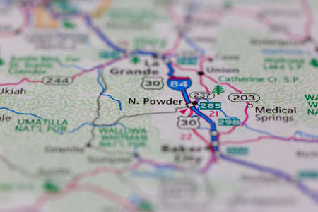06-28-2021 Portsmouth, Hampshire, UK, North Powder Oregon USA shown on a Geography map or road mapのeditorial素材