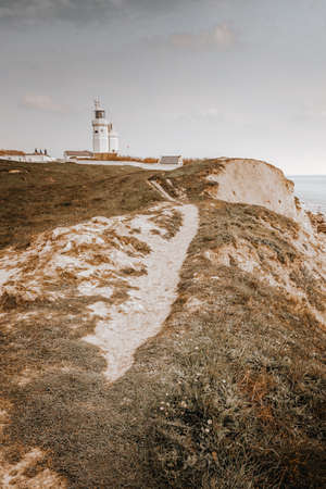 St Catherine's lighthouse, Niton Isle of wight overlooking cliffs in autumnの写真素材