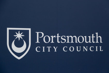 07-07-2021 Portsmouth, Hampshire, UK The Portsmouth City Council logo on a sign boardのeditorial素材