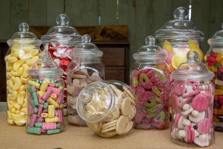 retro sweets or candy in glass jarsの写真素材