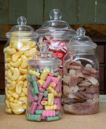 retro sweets or candy in glass jarsの写真素材