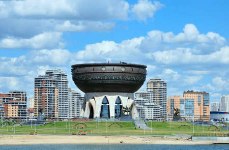 Kazan, Tatarstan, Russia - July 6, 2016. Kazan Central Wedding Palace. Sculptor Dashi Namdakov. View of the right bank of the river Kazanka.のeditorial素材