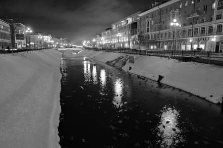 Kazan, Tatarstan, Russia - December 7, 2017. Street Pravo-Bulachnaya, Levobulachnaya street, Bulak river, bridge "Tears". Night winter city landscape.のeditorial素材