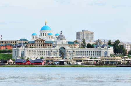 Kazan / Russia - July 14, 2019. Left bank of the river Kazanka. View of the Palace of Agriculture. In the background you can see the reconstructed Cathedral of the Kazan Icon of the Mother of God.のeditorial素材