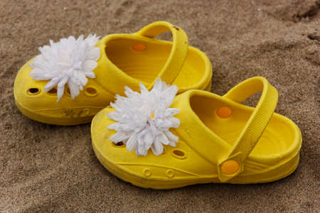 girls beach shoes on the sand, Courtown, Wexford, Ireland
