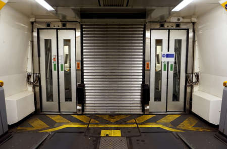 COQUELLES, PAS-DE-CALAIS, FRANCE, MAY 07 2016: Connecting doors between carriages on the Eurotunnel trainのeditorial素材