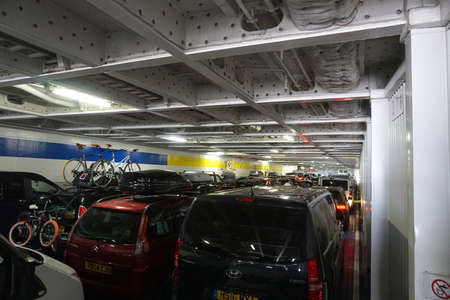 CALAIS, FRANCE, AUGUST 10 2016: Holidaymakers cars waiting to disembark from the cross channel ferry...