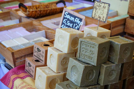 St AYGULF, VAR, PROVENCE, FRANCE, AUGUST 26 2016: Blocks of home made artisan soap on a Provencal market stall in the South of Franceのeditorial素材