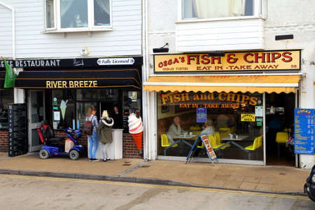 Littlehampton, UK - October 25th 2016: Traditional fish and chip shops on the sea front, selling both eat in and takeaway fish and chipsのeditorial素材
