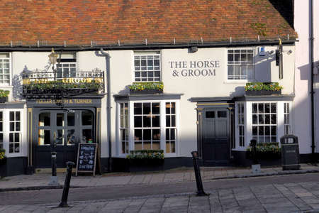 New Alresford, UK - Jan 28 2017: The Horse & Groom public house, or pub, a Georgian building in Broad Street, New Alresford in Hampshire UK.のeditorial素材