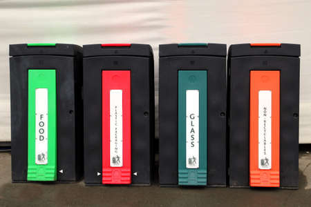 Rubber recycling cintainers with brightly colored labels for Food, Plastic packaging, Glass and...