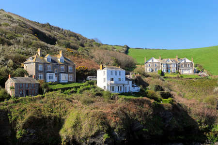 Port Isaac, Cornwall, UK - April 8th 2017: Buildings overlooking Port Isaac harbour, including at far left the house used as the doctor's surgery in the TV show "Doc Martin"のeditorial素材