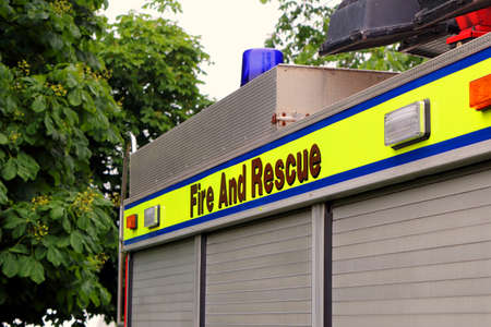 Beaulieu, Hampshire, UK - May 29 2017: Fire And Rescue text on the side of a vintage British fire...