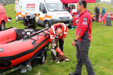 Beaulieu, Hampshire, UK - May 29 2017: Officers, dog, van and dinghy belonging to the Hampshire Search and Rescue teamのeditorial素材