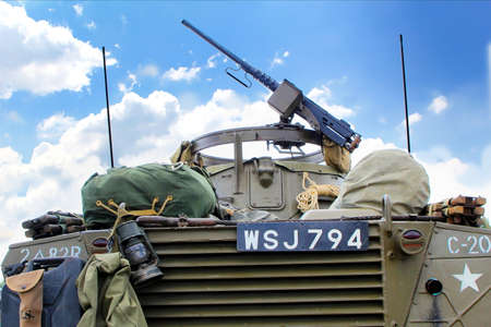 Sandhurst, UK - June 18 2017: Light machine gun mounted on a vintage US Army Ford M-8 Armored Car...