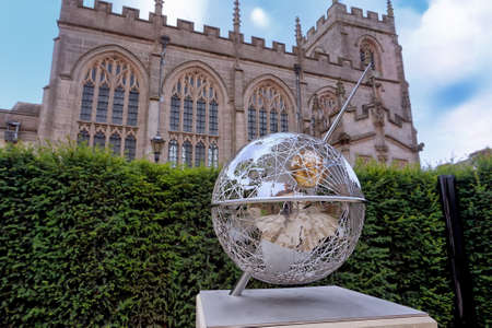 Stratford-upon-Avon, UK - July 21 2017: Sculpture in the garden of Shakespeare's New Place, with the Guild Chapel behindのeditorial素材