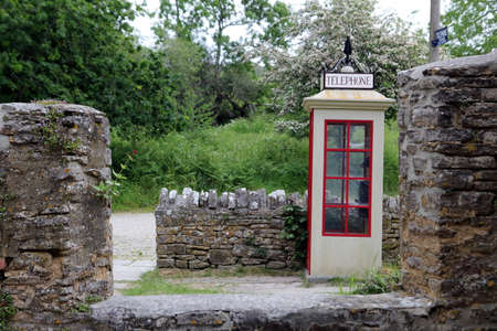 Dorset, England, May 31 2016: Retro English telephone boxのeditorial素材