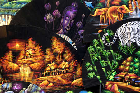 Valras-Plage, Herault, France - Aug 27 2017: Display of batik style oriental fans for sale at a marketのeditorial素材