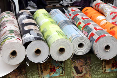 Valras-Plage, Herault, France - Aug 25 2017: Rolls of vinyl floor covering, or linoleum, for sale at a French street marketのeditorial素材