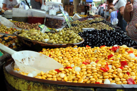 Valras-Plage, Herault, France - Aug 25 2017: Large range of olives for sale at an open air market in the South of Franceのeditorial素材