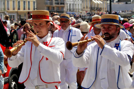Sete, Herault, France  - Aug 21 2017: Musicians of the traditional French band "Los Marineros" marching at the 2017 Festival of Saint-Louis in Sete, Herault, Languedoc, Franceのeditorial素材