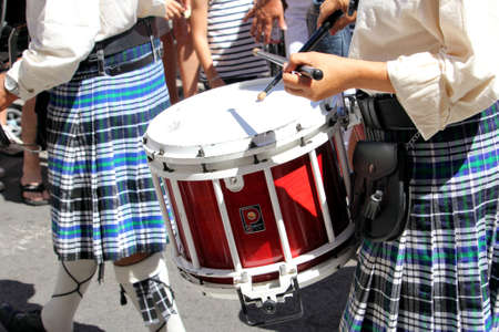 Sete, Herault, France  - Aug 21 2017: Kilted drummers of the traditional French Celtic band "Bagad Aix en Provence" marching at the 2017 Festival of Saint-Louis in Sete, Herault, Languedoc, Franceのeditorial素材
