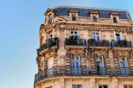 Sete, Herault, France  - Aug 21 2017: Traditional French apartment building with ornate stone and iron work on the balconiesのeditorial素材