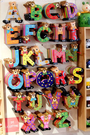 Carcassonne, Languedoc-Roussillon, France - August 24 2017: Kids wooden toys in the shape of letters of the alphabetのeditorial素材