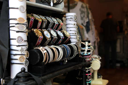 Carcassonne, Languedoc-Roussillon, France - August 24 2017: Bracelets,watches and other costume jewellery on display in a small jewellers shopのeditorial素材