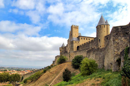 Carcassonne, Languedoc-Roussillon, France - August 24 2017: The medieval French fortified city of Carcassonne, La Cite, Languedoc-Roussillon, France on a beautiful day with blue sky and white cloudsのeditorial素材