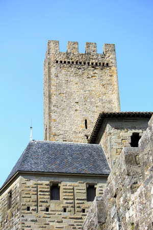 Carcassonne, Languedoc-Roussillon, France - August 24 2017: Stone tower and rooftops in the medieval French fortified city of Carcassonne, La Cite, Languedoc-Roussillon, Franceのeditorial素材