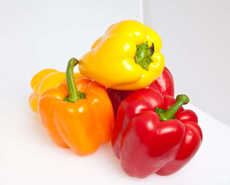 Colored Bell Peppers on a white background