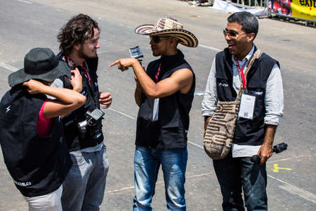 Barranquilla, Colombia - March 1, 2014 - A documentary crew discusses their next move while filming the Battalla de Flores, Carnival de CBarranquilla.のeditorial素材