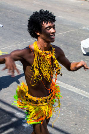 Barranquilla, Colombia - March 1, 2014 - Performers in elaborate costume sing, dance, and stroll...