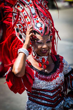 Barranquilla, Colombia - March 1, 2014 - Performers in elaborate costume sing, dance, and stroll their way down the streets of Barranquilla during the Battalla de Flores during Carnivalのeditorial素材