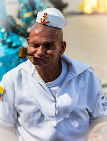 Barranquilla, Colombia - March 1, 2014 - Performers in elaborate costume sing, dance, and stroll their way down the streets of Barranquilla during the Battalla de Flores. The Pinnacle of the Carnival de Barranquilla parades.のeditorial素材