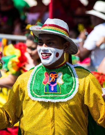 Barranquilla, Colombia - March 1, 2014 - Performers in elaborate costume sing, dance, and stroll...