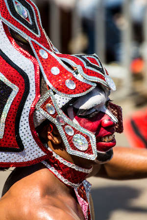 Barranquilla, Colombia - March 1, 2014 - Performers in elaborate costume sing, dance, and stroll their way down the streets of Barranquilla during the Battalla de Flores during Carnivalのeditorial素材
