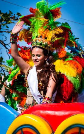 Barranquilla, Colombia - March 1, 2014 - Colorful floats full of singers, dancers, and models make their way down the street during the Battalla de Flores. The pinnacle parade of the Carnival de Barranquilla.のeditorial素材