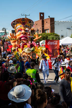 Barranquilla, Colombia - March 1, 2014 - Colorful floats full of singers, dancers, and models make their way down the street during the Battalla de Flores. The pinnacle parade of the Carnival de Barranquilla.のeditorial素材