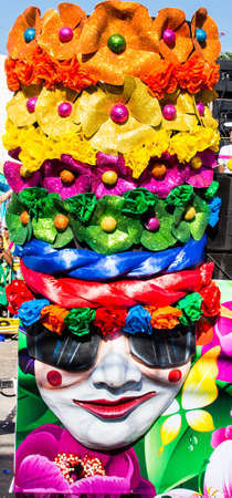 Barranquilla, Colombia - March 1, 2014 - Colorful floats full of singers, dancers, and models make their way down the street during the Battalla de Flores. The pinnacle parade of the Carnival de Barranquilla.のeditorial素材