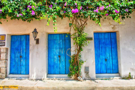 The ornate and historic doors of Cartagena's colorful old city streets.の写真素材