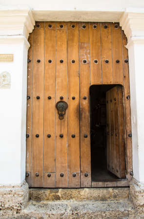 The ornate and historic doors of Cartagena's colorful old city streets.の写真素材