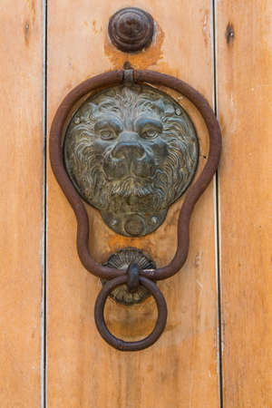 Ornate door knockers and detail on th famous doors of Cartagena's historic old city.