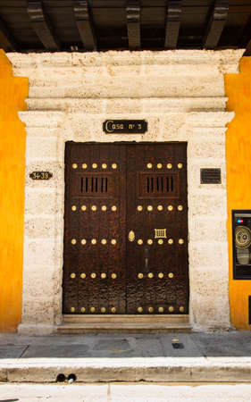 The ornate and historic doors of Cartagena's colorful old city streets.の写真素材