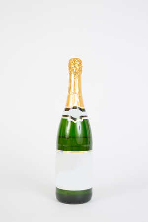 A champagne bottle on a white background.の写真素材